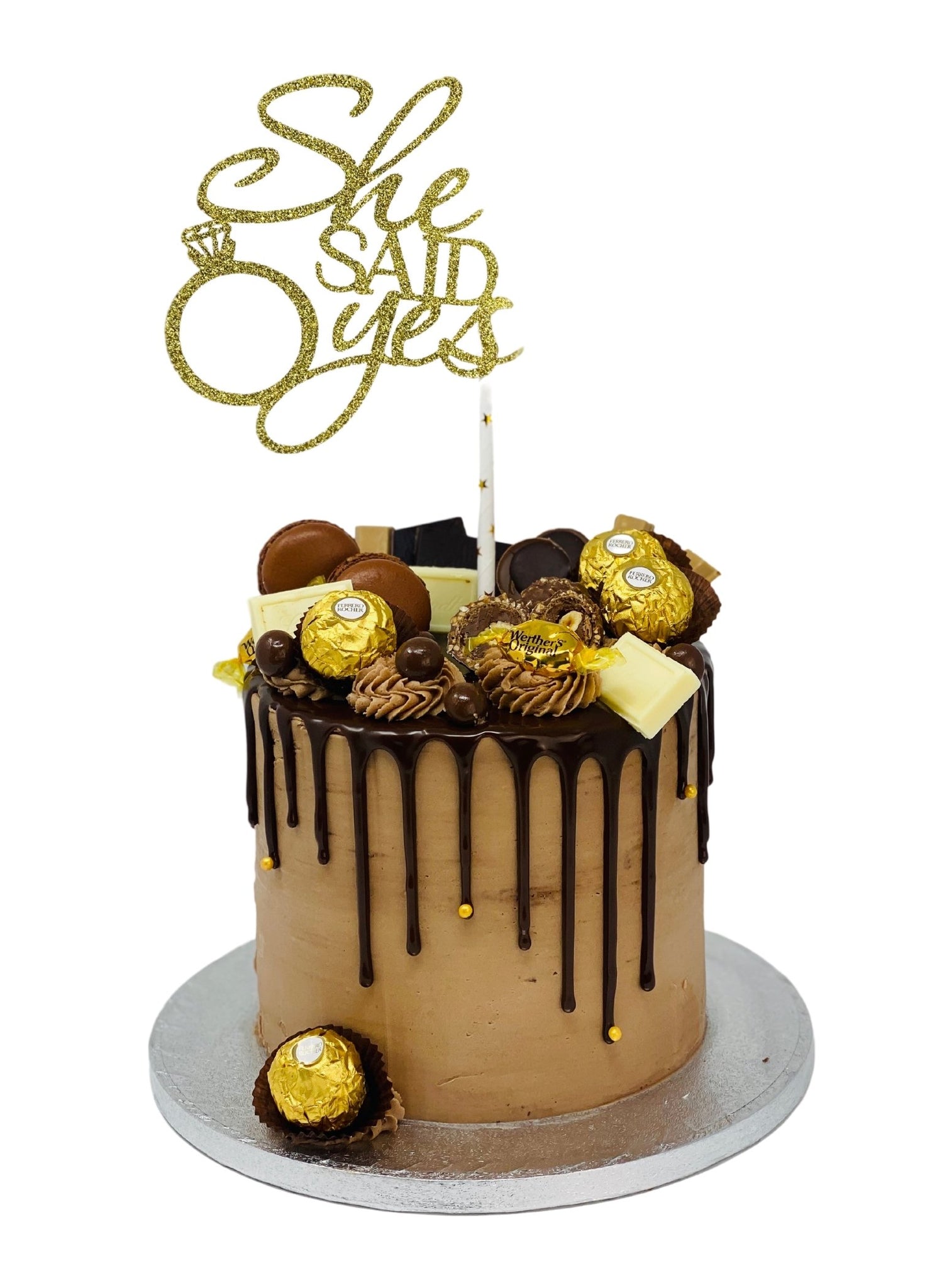 Sweet-Arts By Sare - A Ferrero Rocher & Toblerone Cake! - Chocolate Mud Cake  layers with a hazelnut Buttercream Frosting, crushed hazelnuts and  decorated with Ferrero Rochers, Toblerone and Maltesers. #cake  #cakesofinstagram #